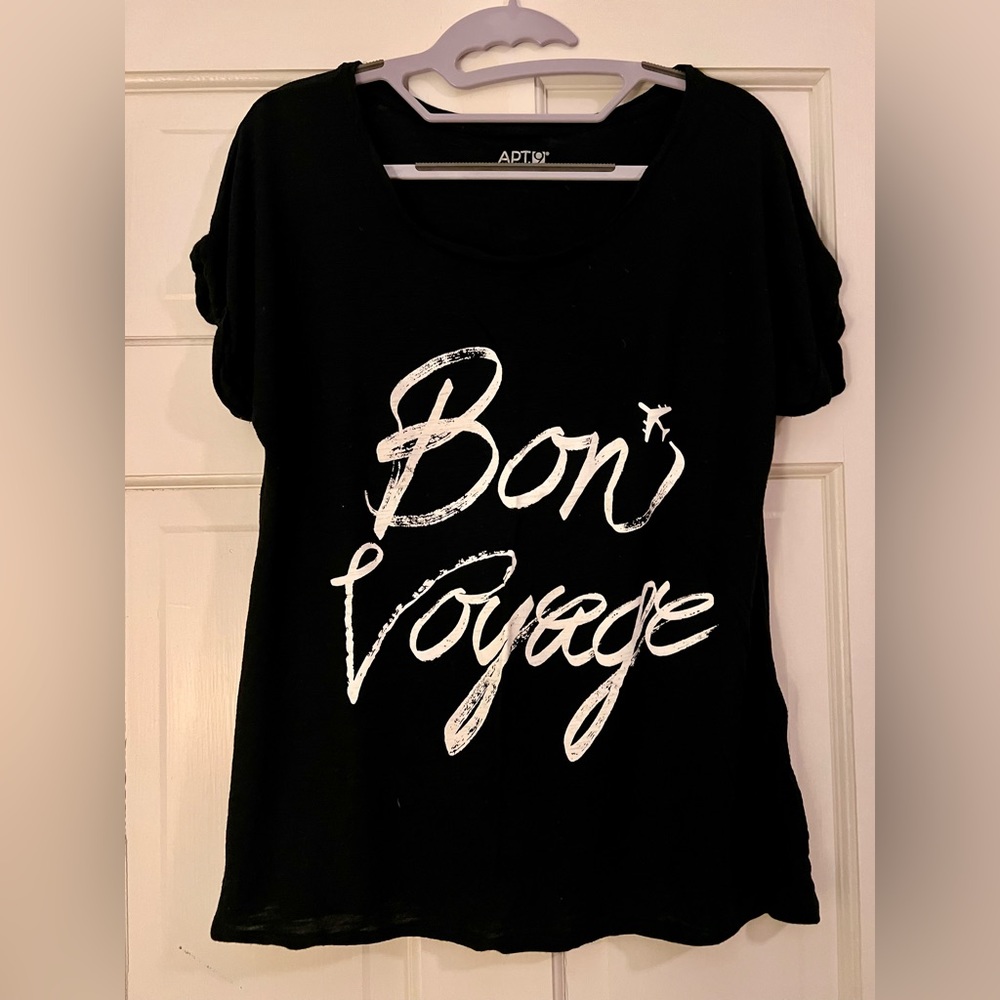 Apt 9 black shirt size large. White letter that’s says “Bon Voyage”